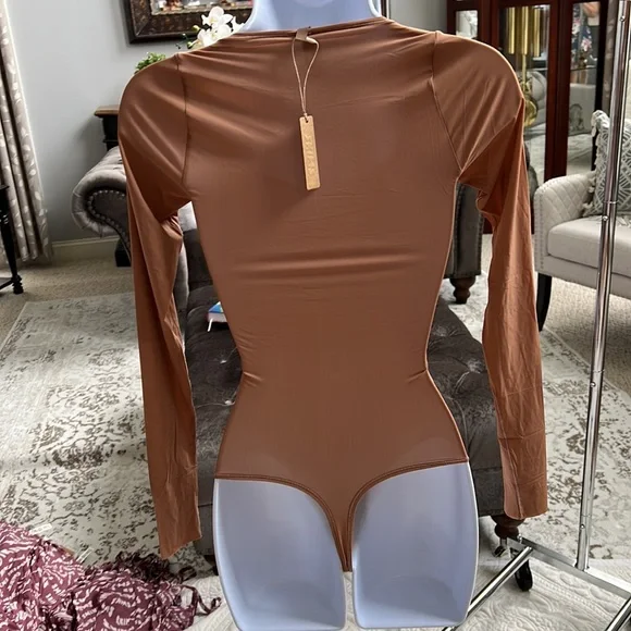 SKIMS Long Sleeve Bodysuit in Tan - Picture 5 of 9